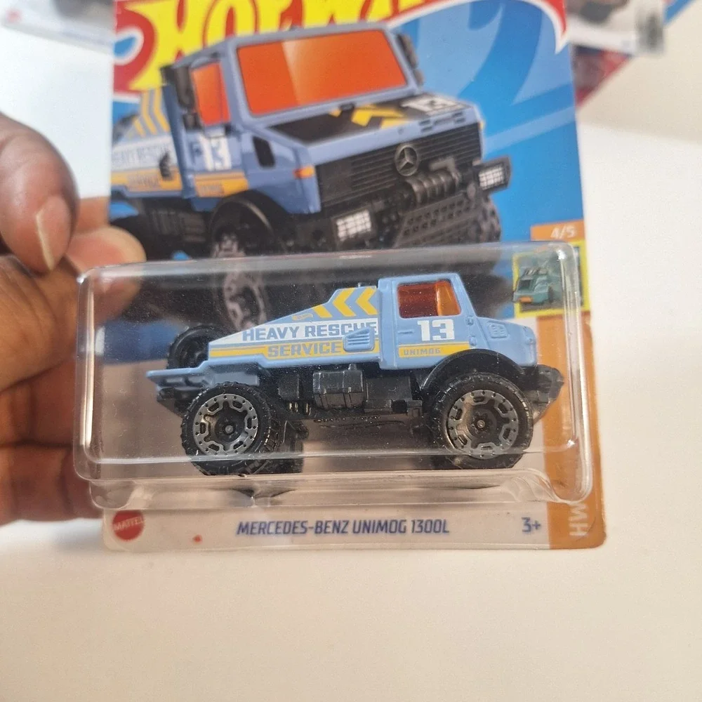 Hot Wheels Trucks 7 / Mercedes Unimog Blue Zamac Green/ Target Red Hummer Rescue